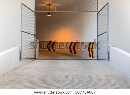entrance to the parking lot in the office building