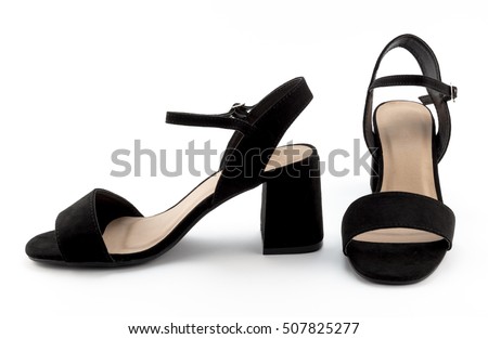 Studio photo of a pair of black suede female sandals on white background Royalty-Free Stock Photo #507825277