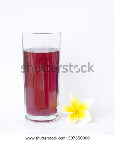 Glass of grape juice. Isolated on white background