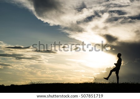 Silhouette of a beautiful sunset background blur