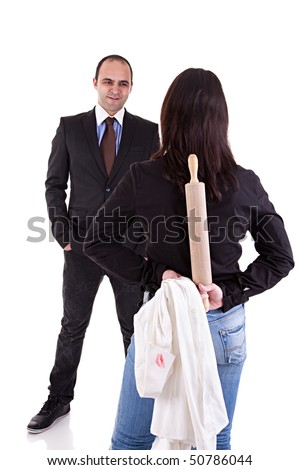 woman waiting for her husband, with the rolling pin and a white shirt with lipstick mark hidden behind his back, isolated on white background