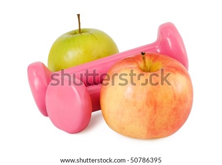Two pink dumbbells and two apples on a white background
