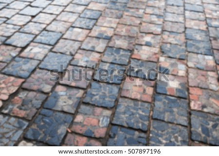   old road made of stone, photographed close-up, defocused