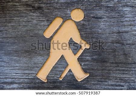 hiker icon sign on wood texture background 