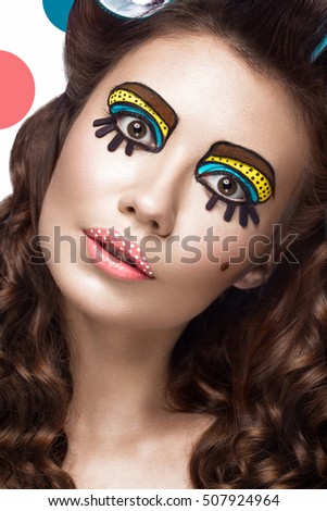 Photo of surprised young woman with professional comic pop art make-up and design manicure. Creative beauty style and nails. Photos shot in studio