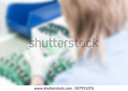 Electronics production plant theme creative abstract blur background with bokeh effect