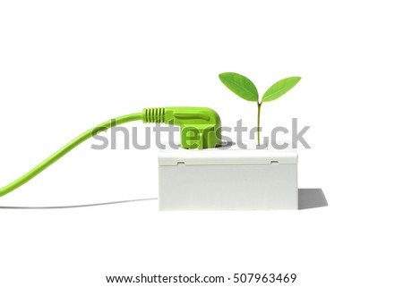 Green plug with a young green plant / Green energy concept                                Royalty-Free Stock Photo #507963469
