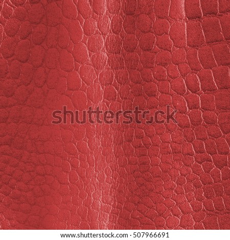 old red artificial snake skin texture or background