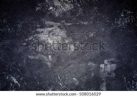 Abstract black background with luxurious vintage grunge background texture, elegant monochrome background with gray center for website template background or luxury brochure, distressed background