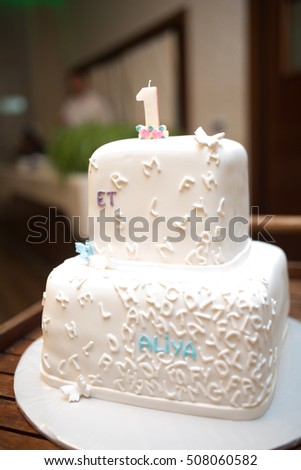 White Wedding cake on table, sweet, shallow focus vertical