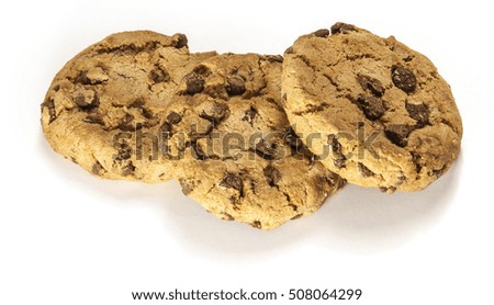 A macro photo of three crunchy chocolate chips cookies, shot from above on a white background