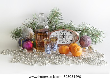 New year.Christmas.Ripe fruit,champagne,clock,midnight.