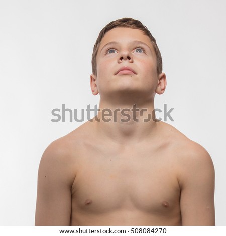 Sportsman boy brunette on a white background