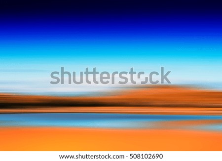 Horizontal motion blur autumn lake background