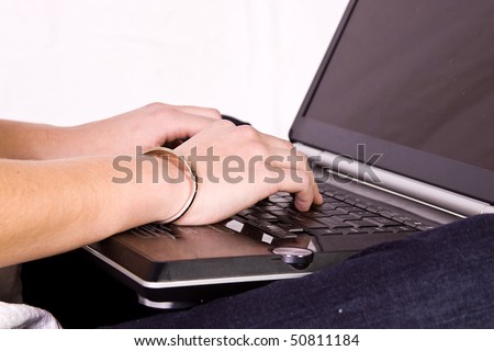 Close up on a Girl's Hand Typing on the Laptop