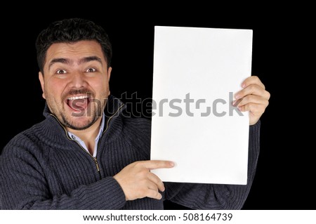 Young man holding blank sign All on black background