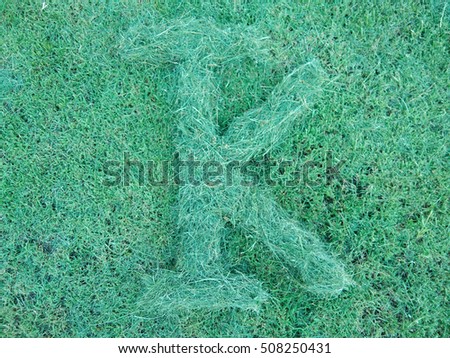 grass letter K isolated on grass background