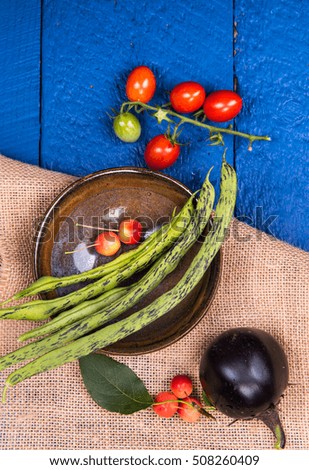 The vegetables in the wood blue background picture.