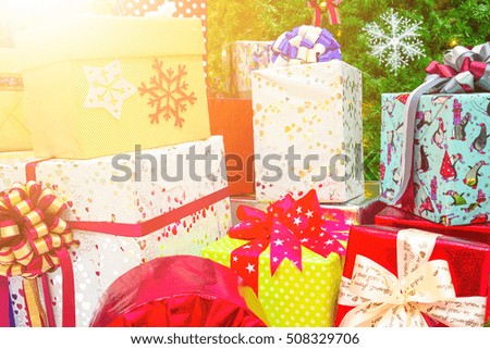 Christmas tree and Christmas decorations. Christmas tree and gift boxes under the tree. - vintage retro picture style.