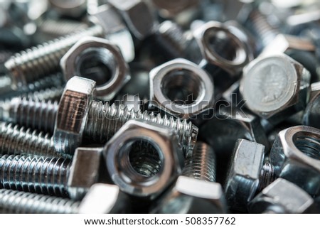Metal nuts and bolts Royalty-Free Stock Photo #508357762