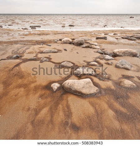 Stony beach by Baltic sea