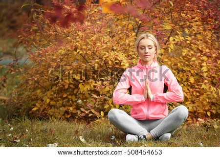 Athlete girl relaxing in park