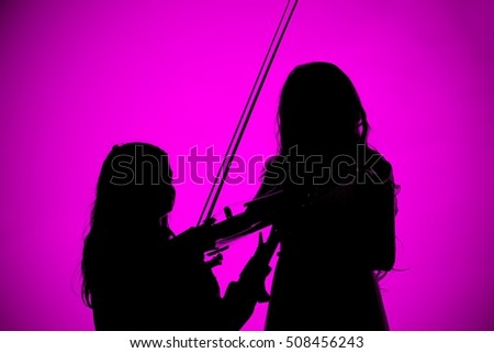 Silhouette musicians playing music with purple background