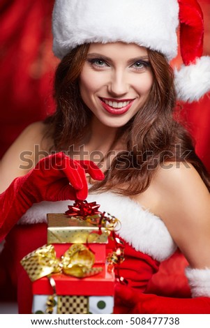 Christmas woman with gifts box .