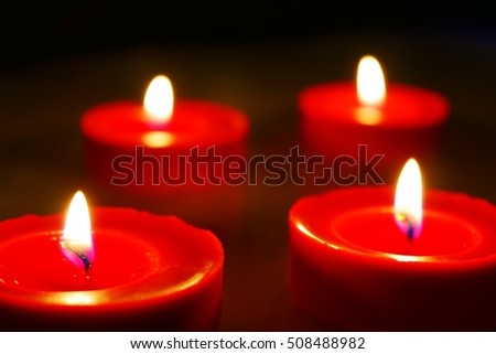 Advent decoration with four red candles