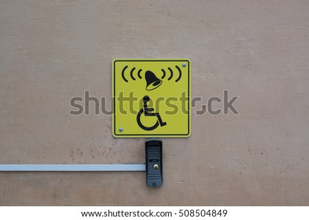 Call button for the disabled built-in wall marked yellow tablets