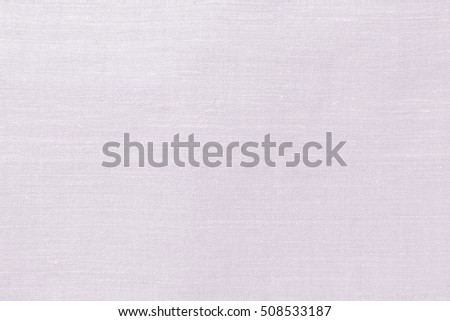Close-up handmade natural cotton, linen old fabric textile cloth in light purple violet vintage retro color for abstract background of book cover