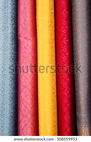 Artistic variety shade tone colors ornaments patterns of Thai silk