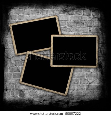 Blank photo frames on wall