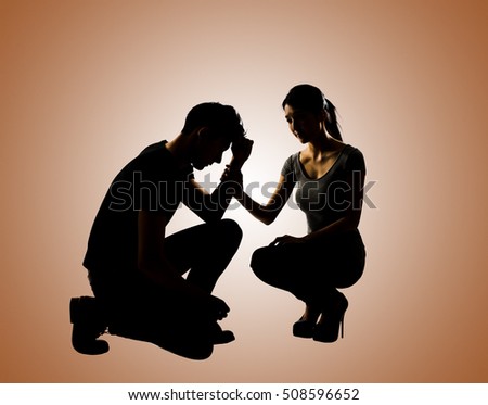 Silhouette of one sad Asian man squat and his wife give comfort to him, full length portrait isolated