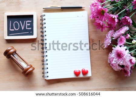 blank notebook on wood textures