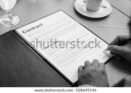 Business Person Signing Contract Concept