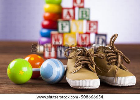 Children's of toy accessories on wooden background
