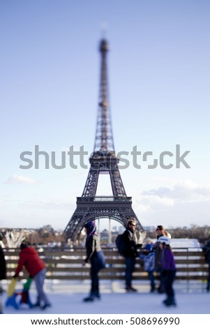 Ice skating by Eiffel Tower, Paris, France