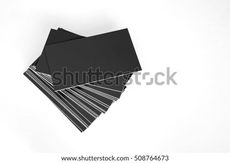 Black business cards on white background