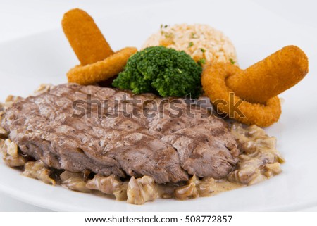 mushroom over grilled and mustard sauce