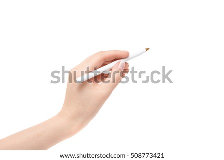 Isolated female hand holds a pen on a white background.