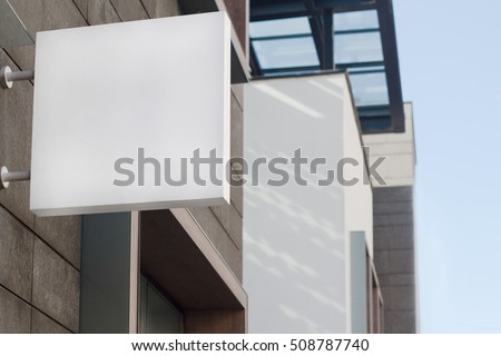 Horizontal front view of empty square signage on a building with modern architecture