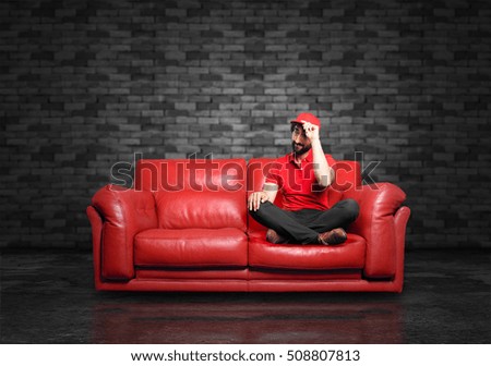 young funny man sitting down.