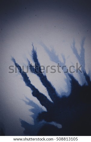 Ink black, dark blue drops and splatters on white background