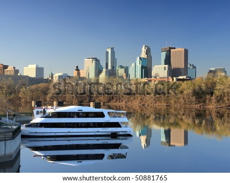 Minneapolis downtown with reflection in Mississippi at morning