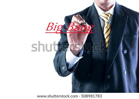 Businessman hand writing Big Bang on transparent wipe board.