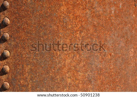 Closeup of rusty metal with knobs Royalty-Free Stock Photo #50901238