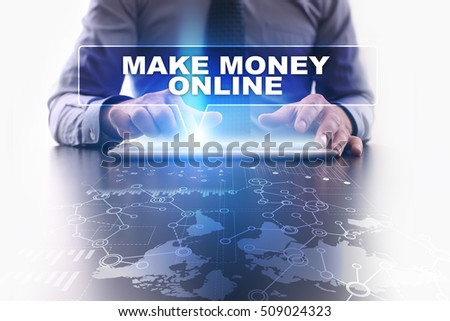 Businessman is using tablet pc, pressing on virtual screen and selecting make money online.