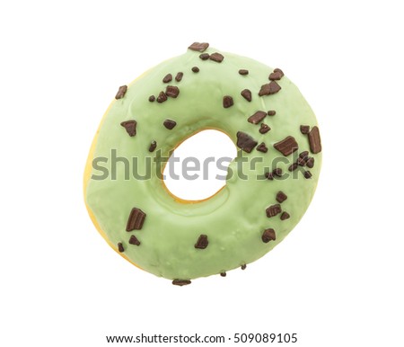 green donut with chocolate sprinkles isolated on white background