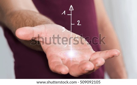 Man using hand-drawn business presentation in his hand on blurred background